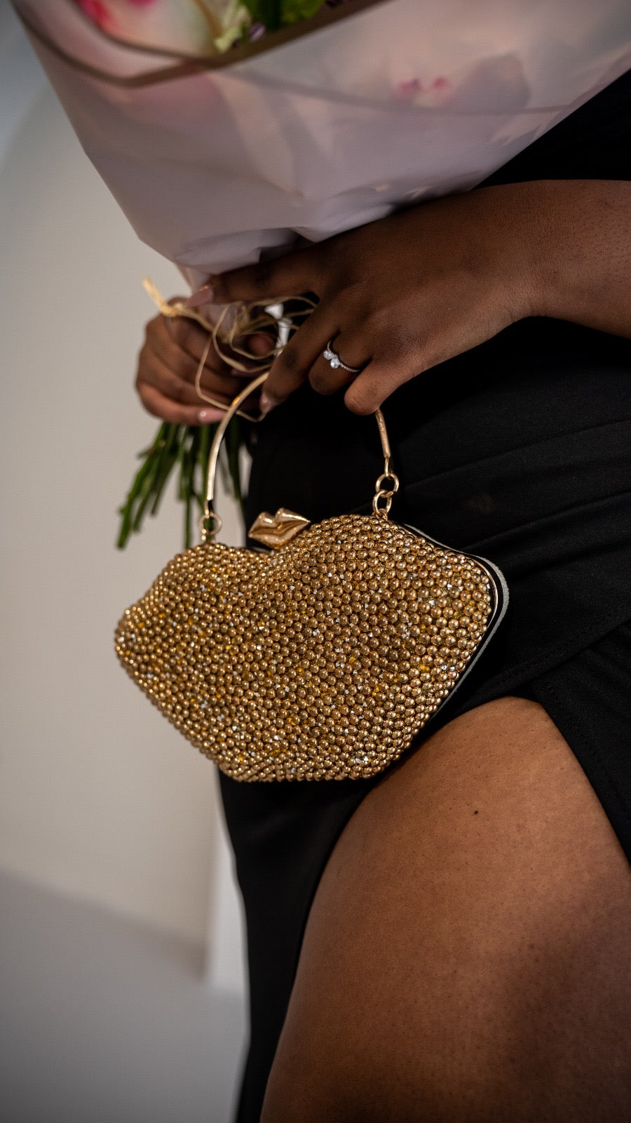 Gold clutch bag
